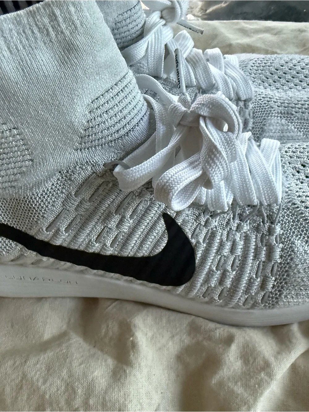 Nike Women’s Lunarepic White and Black Flyknit running Sneakers
